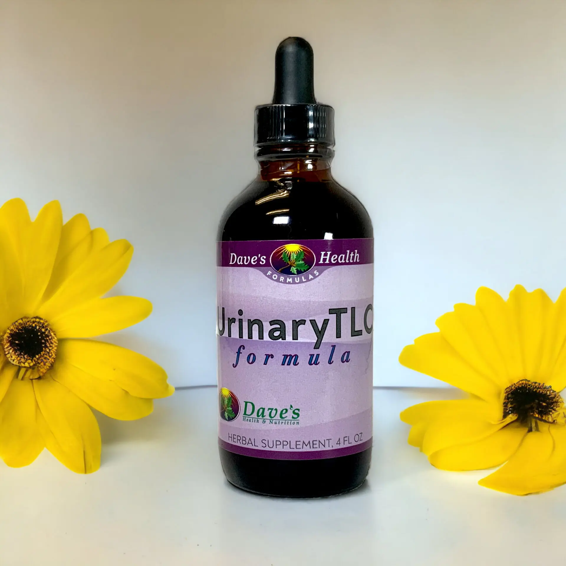 Urinary TLC 4oz with a flower background.