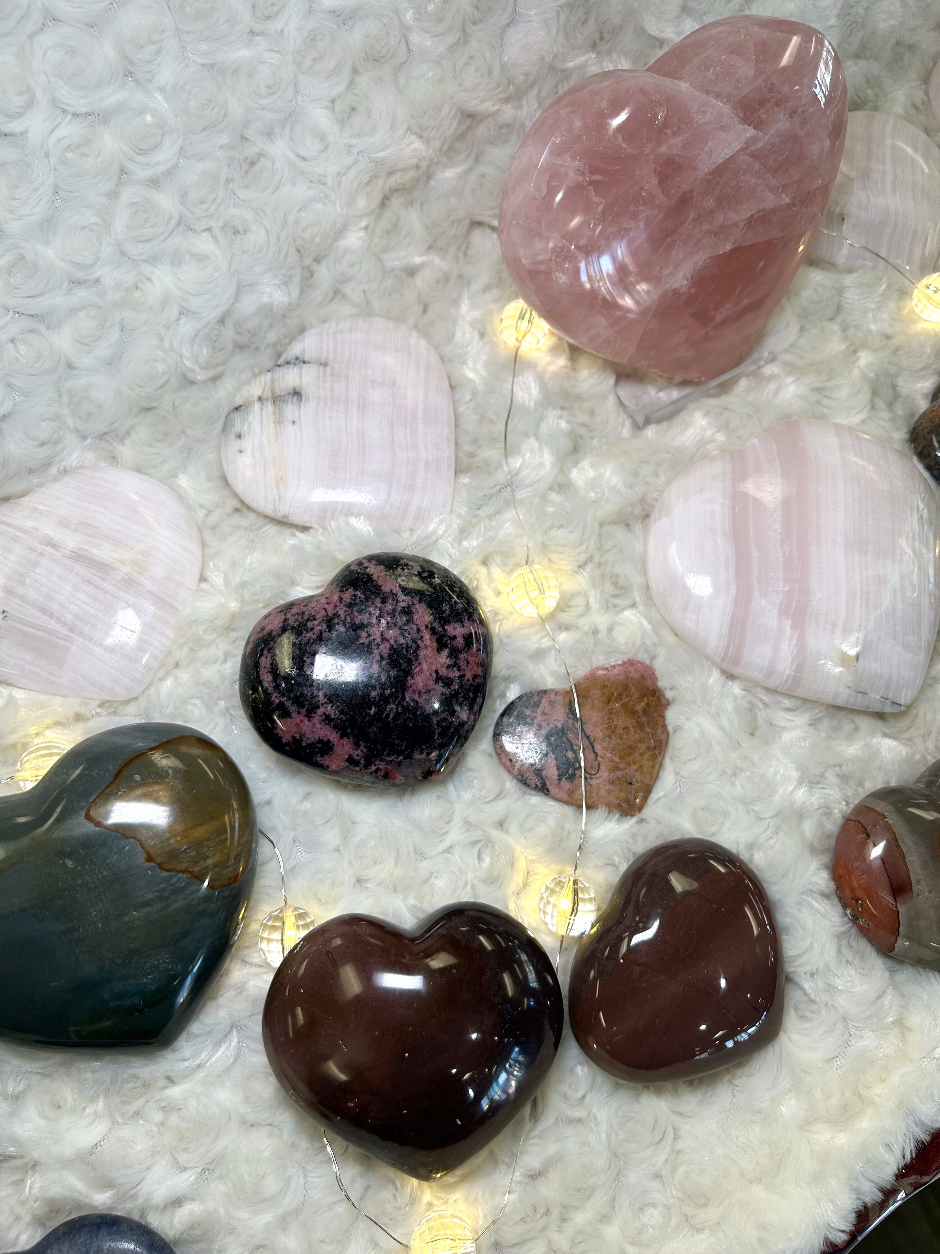 Heart-shaped crystals on table.
